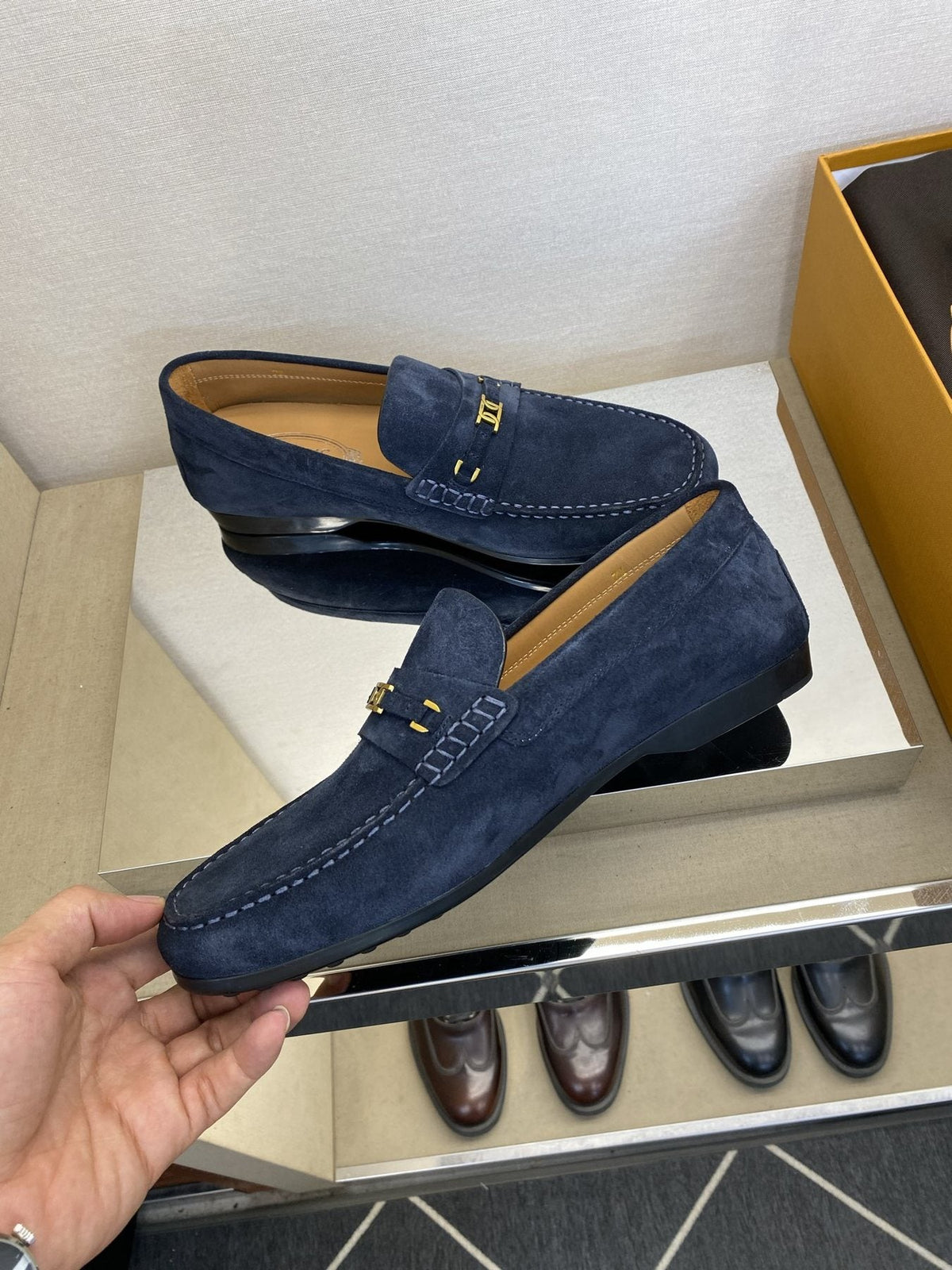 Tod's Gold-Tone Hardware Loafers — model