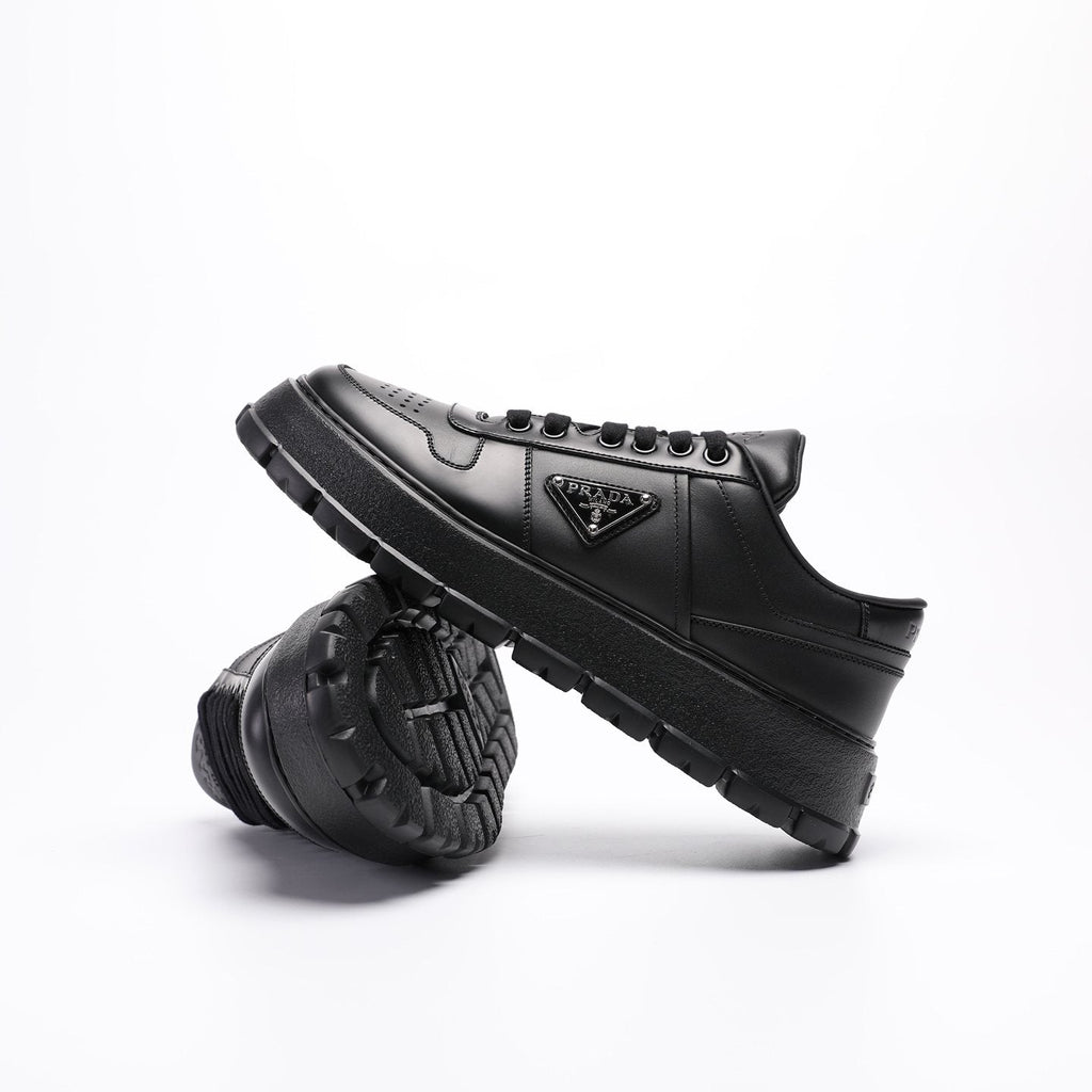 PRADA Triangle Plaque Low-Top Sneakers — side